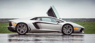 We're driving around Moscow Raceway in the Lamborghini Aventador and Gallardo coupes