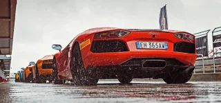 We're driving around Moscow Raceway in the Lamborghini Aventador and Gallardo coupes