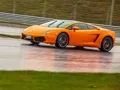 We're driving around Moscow Raceway in the Lamborghini Aventador and Gallardo coupes