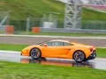 We're driving around Moscow Raceway in the Lamborghini Aventador and Gallardo coupes