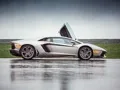 We're driving around Moscow Raceway in the Lamborghini Aventador and Gallardo coupes