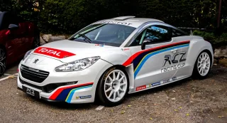 We break records behind the wheel of the powerful Peugeot RCZ R coupe