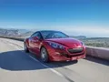 We break records behind the wheel of the powerful Peugeot RCZ R coupe