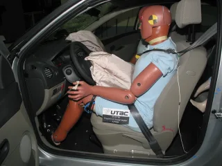 Frontal impact driver