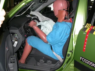 Frontal impact driver