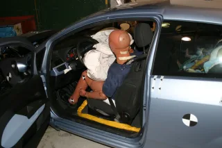 Frontal impact driver
