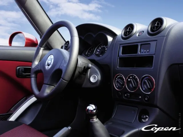 Daihatsu Copen coupe convertible — 2