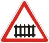 Railway crossing with barrier